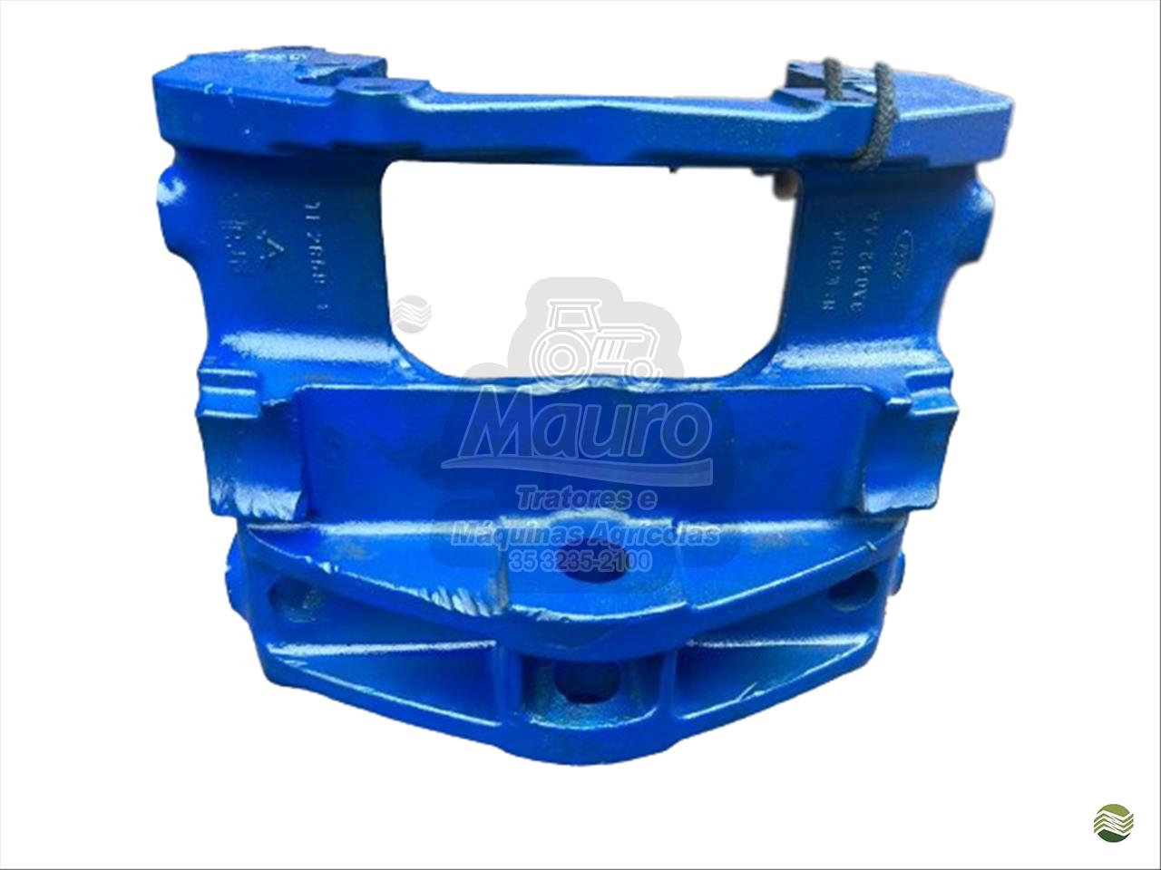 E3NN3A042AA - SUPORTE DO EIXO DIANTEIRO FORD 5610/6610/7610 DIREÇÃO HIDROSTÁTICA 